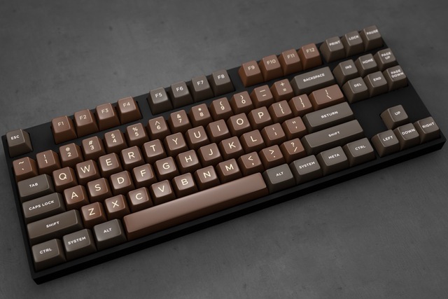 
Được tạo ra bởi Zambumon, set keycap SA có tên Chocolatier này ngay lập tức khiến bạn nghĩ tới những thanh chocolate ngon lành ngọt lịm. Bản thân những nút được chế tác từ chất liệu nhựa ABS có độ bóng hoàn hảo, kết hợp cùng màu sắc khiến chiếc bàn phím càng thêm cuốn hút.
