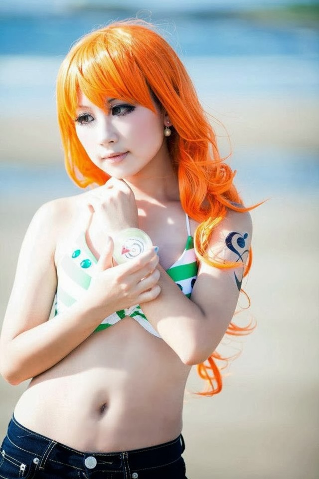 Bỏng mắt với những hình ảnh cosplay miêu tặc Nami trong One Piece khiến các fan đứng ngồi không yên - Ảnh 12.