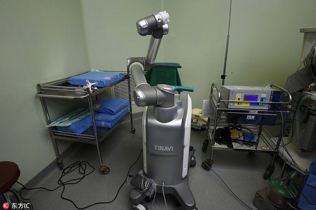 Robot Trung Quốc thực hiện ca phẫu thuật thành công trên cơ thể người, mở ra một tương lai mới cho toàn thế giới - Ảnh 2.