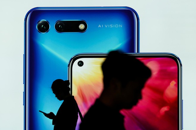 Reuters: Huawei đang đàm phán bán bộ phận Honor - Ảnh 1.