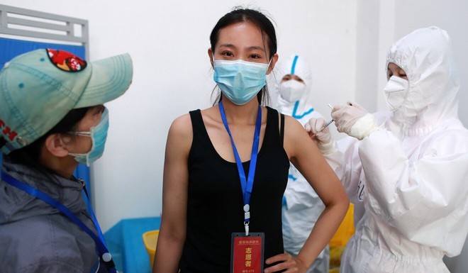 Trung Quốc thử nghiệm trên người loại vắc-xin COVID-19 thứ ba, hi vọng sẽ chống lại tất cả biến thể SARS-CoV-2 - Ảnh 2.