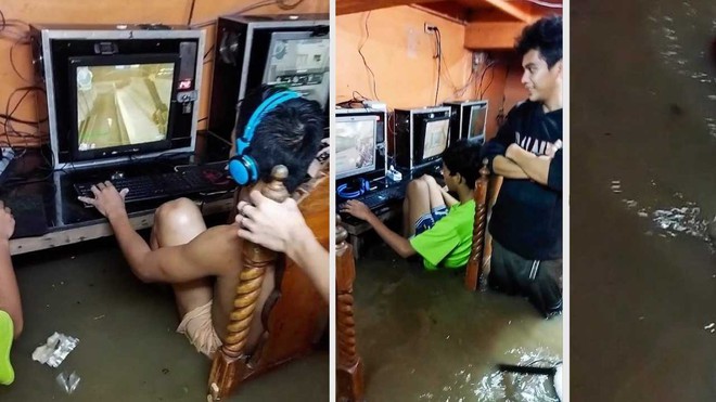 Game thủ nhí phớt lờ nguy cơ bị điện giật, chìm đắm trong game khi quán net ngập nước lũ - Ảnh 1. Game thủ nhí phớt lờ nguy cơ bị điện giật, chìm đắm trong game khi quán net ngập nước lũ - Ảnh 1.