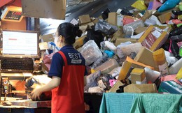 Bên trong một trung tâm giao nhận ngày giáp Tết: nhân viên "bơi" trong biển hàng hóa, băng chuyền phân loại tự động hàng hóa tốc độ 2 mili giây