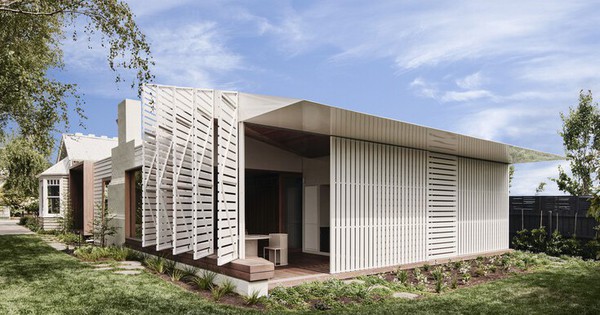 The white house with the door design like a fish gill, the space is delicate, luxurious, and very cool