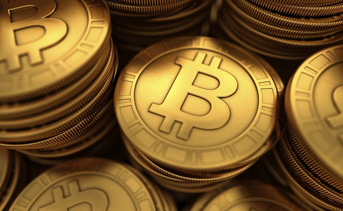 Tiền ảo Bitcoin tăng giá kỷ lục lên mức 900 USD, đe dọa nền kinh tế thế giới
